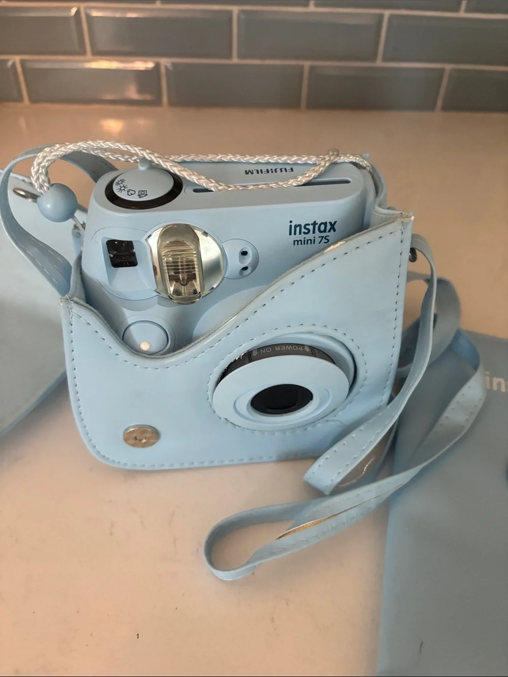 Fujifilm Instax Mini Camera with Light Blue Case and Album